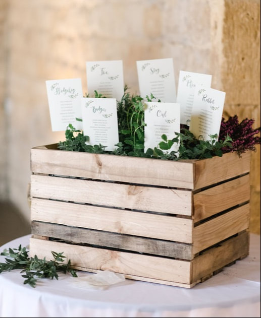 seating plan, green leaves, cards