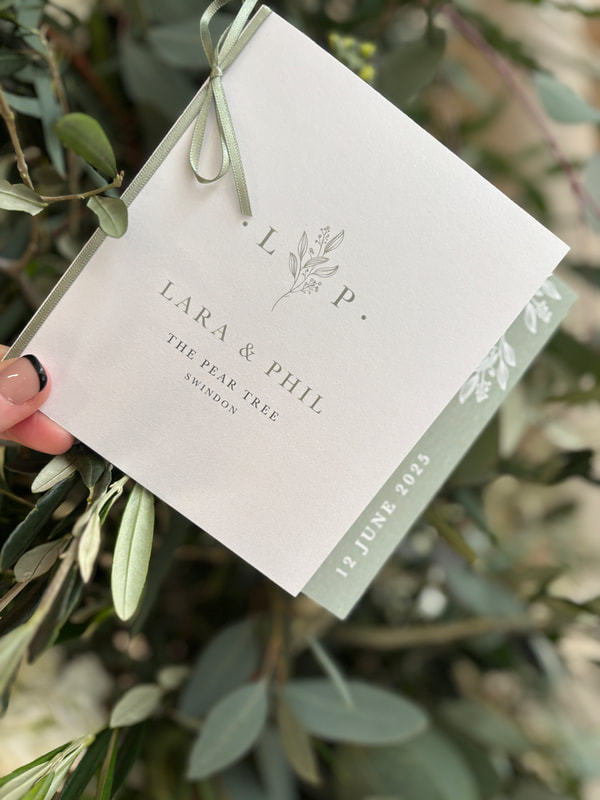 Sage green wedding invites, minimal vellum wedding invites, elegant translucent invitations, refined simplicity wedding stationery, classic modern wedding designs, personalised love story invitations, bespoke wedding stationery bundles, coordinated save-the-dates, stylish wedding seating plans, timeless wedding invitation designs, graceful vellum allure, understated luxury wedding invites, contemporary wedding themes, rustic autumn wedding charm, elegant modern wedding stationery