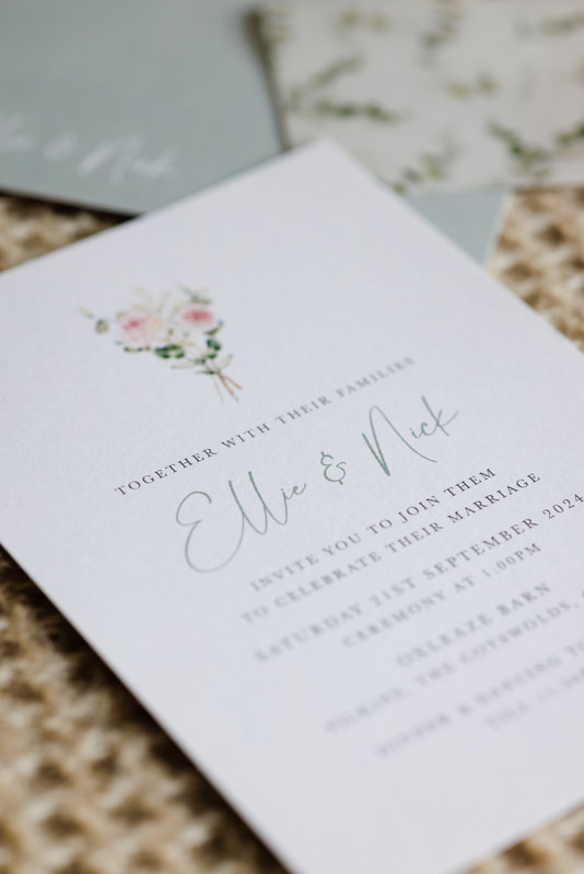 Hand-painted floral wedding invitation in blush and sage, Elegant UK bespoke wedding stationery with foliage design, and Sophisticated custom wedding cards for personalised weddings